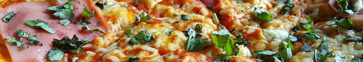 Eating Pizza at New Yorker Pizzeria & Pasta restaurant in Albany, NY.